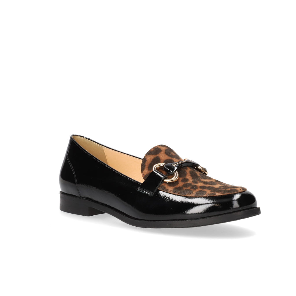 Black patent leather loafer with patterned toe cap on a white background Black patent leather loafer with a patterned tassel on a white bioeco strabane shoes background