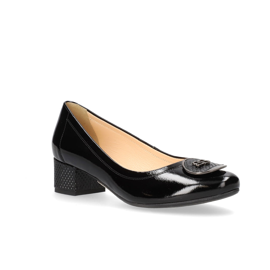 Black patent leather shoe with a decorative buckle on a white background Gormley Shoes Strabane Bioeco
