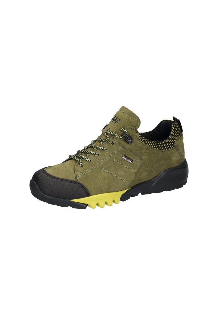 Green hiking shoe with black sole on a white background