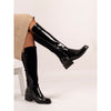 Black knee-high boots with a glossy finish on a white background lunar boots ladies Gormley shoes strabane